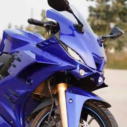 Racing spoiler for faired bikes